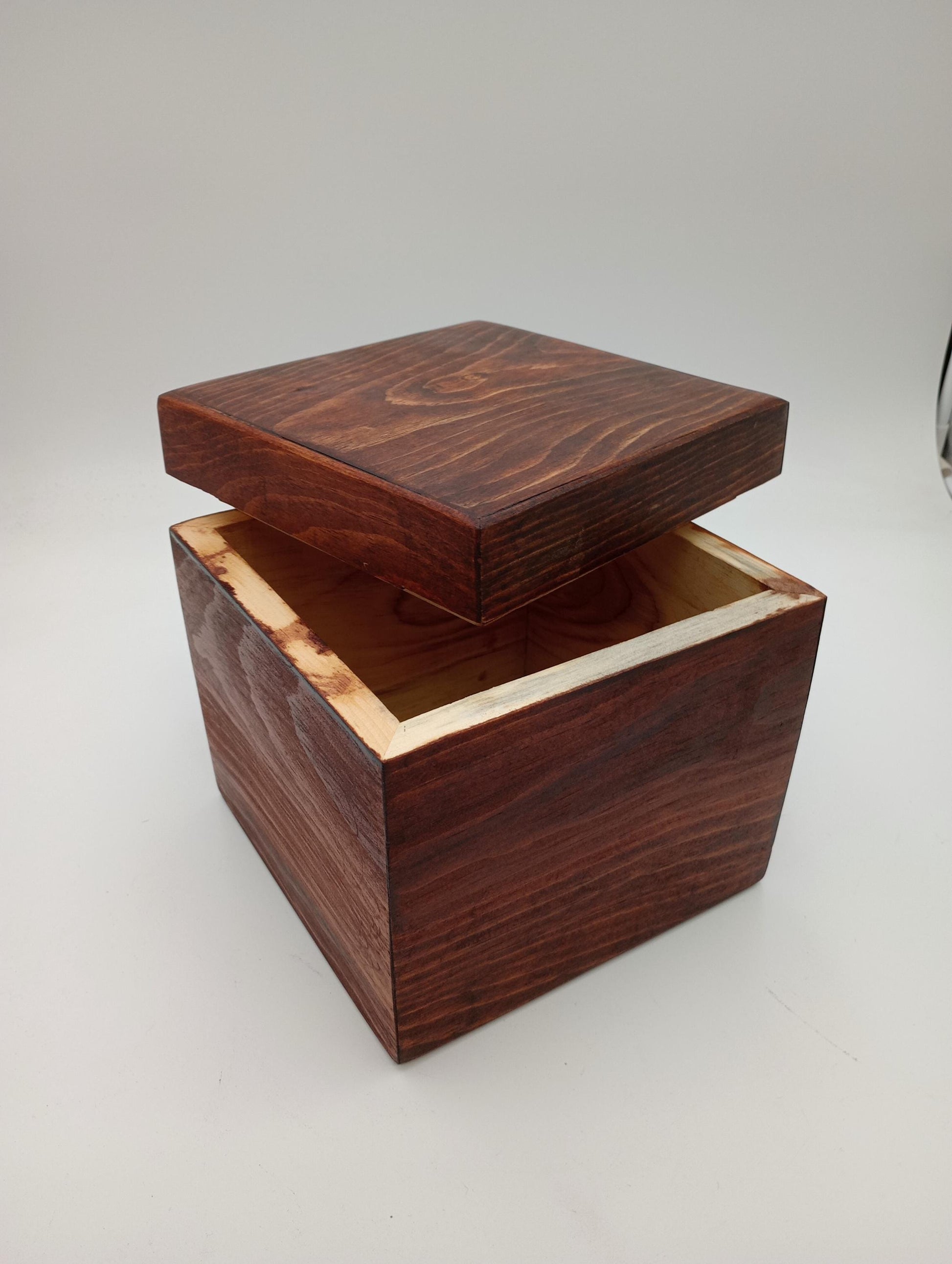 Handcrafted Wooden Urn: Tribal Artisan Design