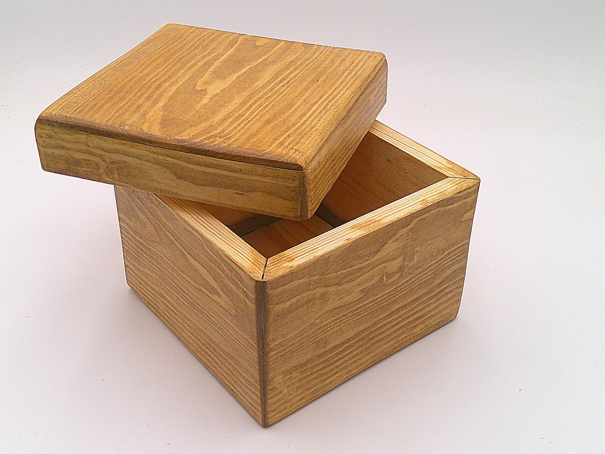 Handcrafted Wooden Urn: Tribal Artisan Design