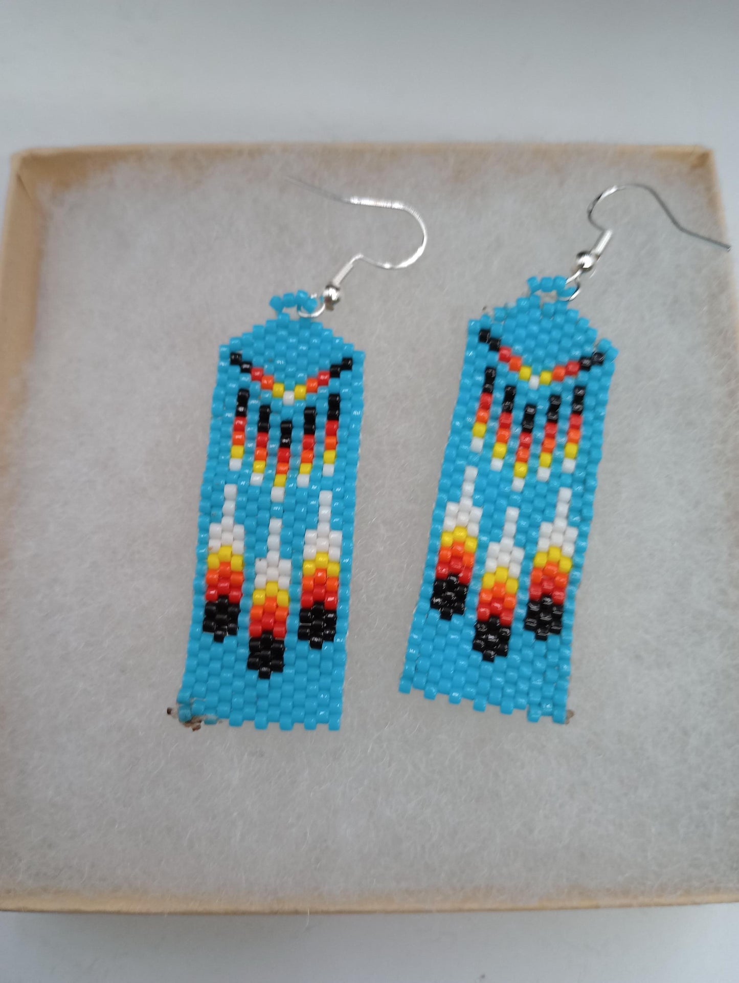 Sky blue Feathers brick stitch earrings Handmade/Traditional design