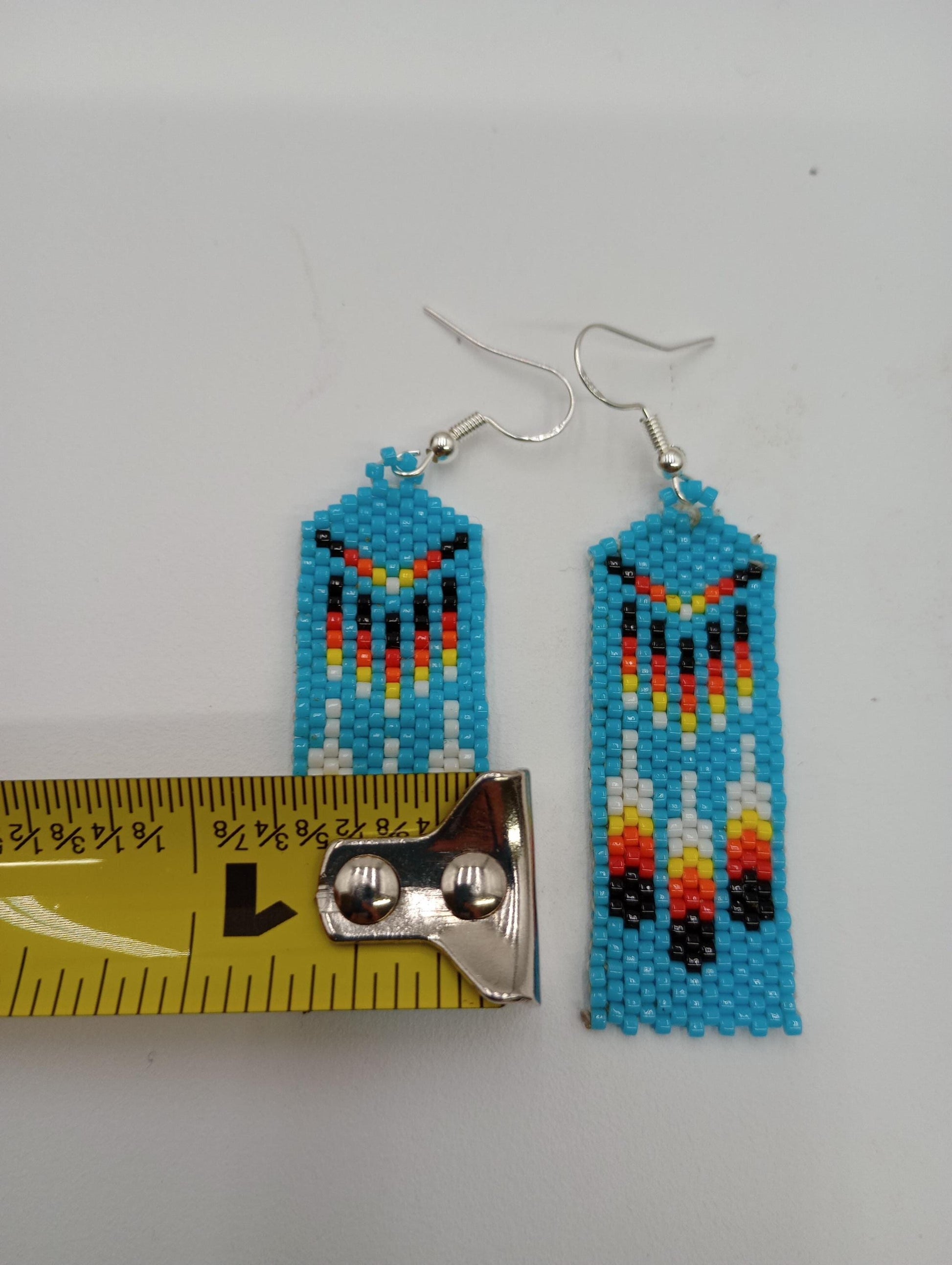 Sky blue Feathers brick stitch earrings Handmade/Traditional design